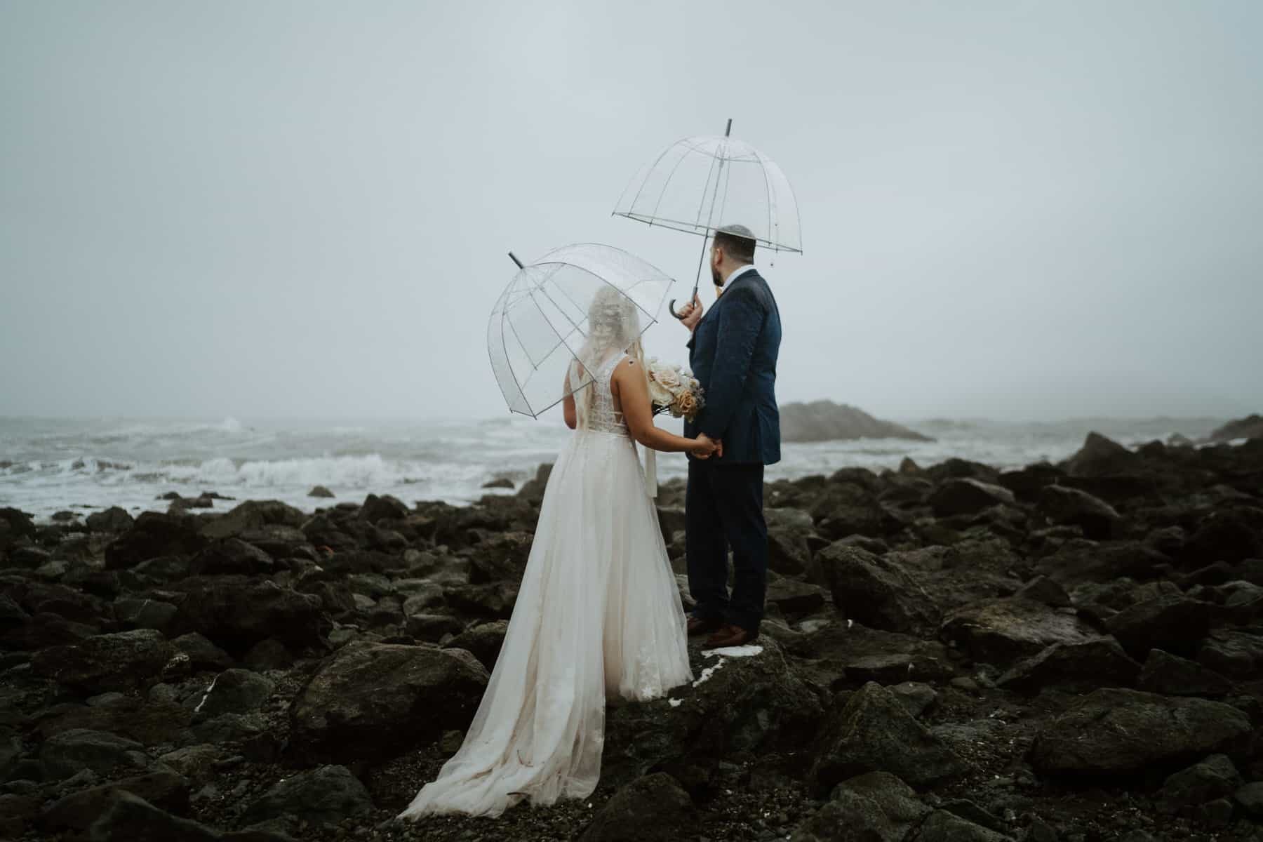 wedding photo of couple overlooking the ocean